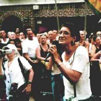Sylvia speaking in front of the Stonewall Bar, 2002.